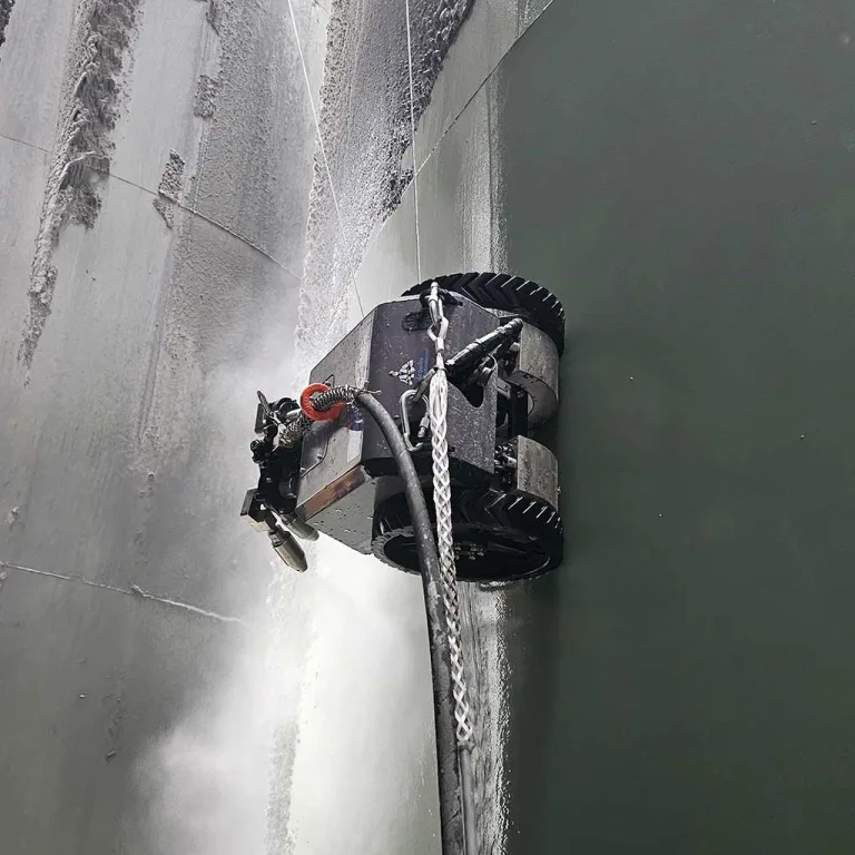 robot cleaning side of a tank